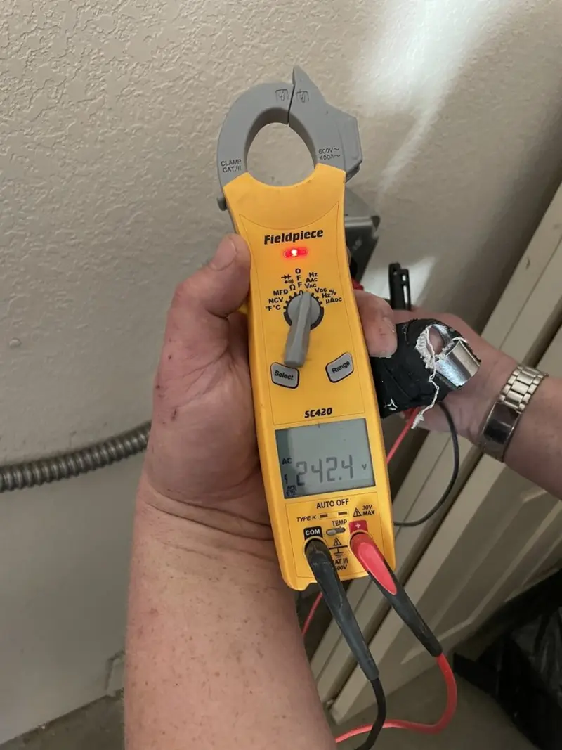 Voltage testing with clamp meter during Hot Tub / Pool Electrical Wiring in West Windsor